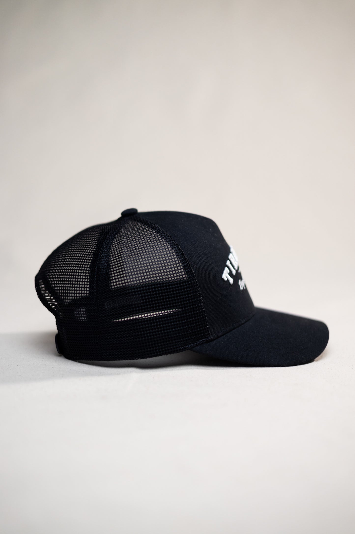 Tired Dad // Keep Showing Up // All Black Trucker