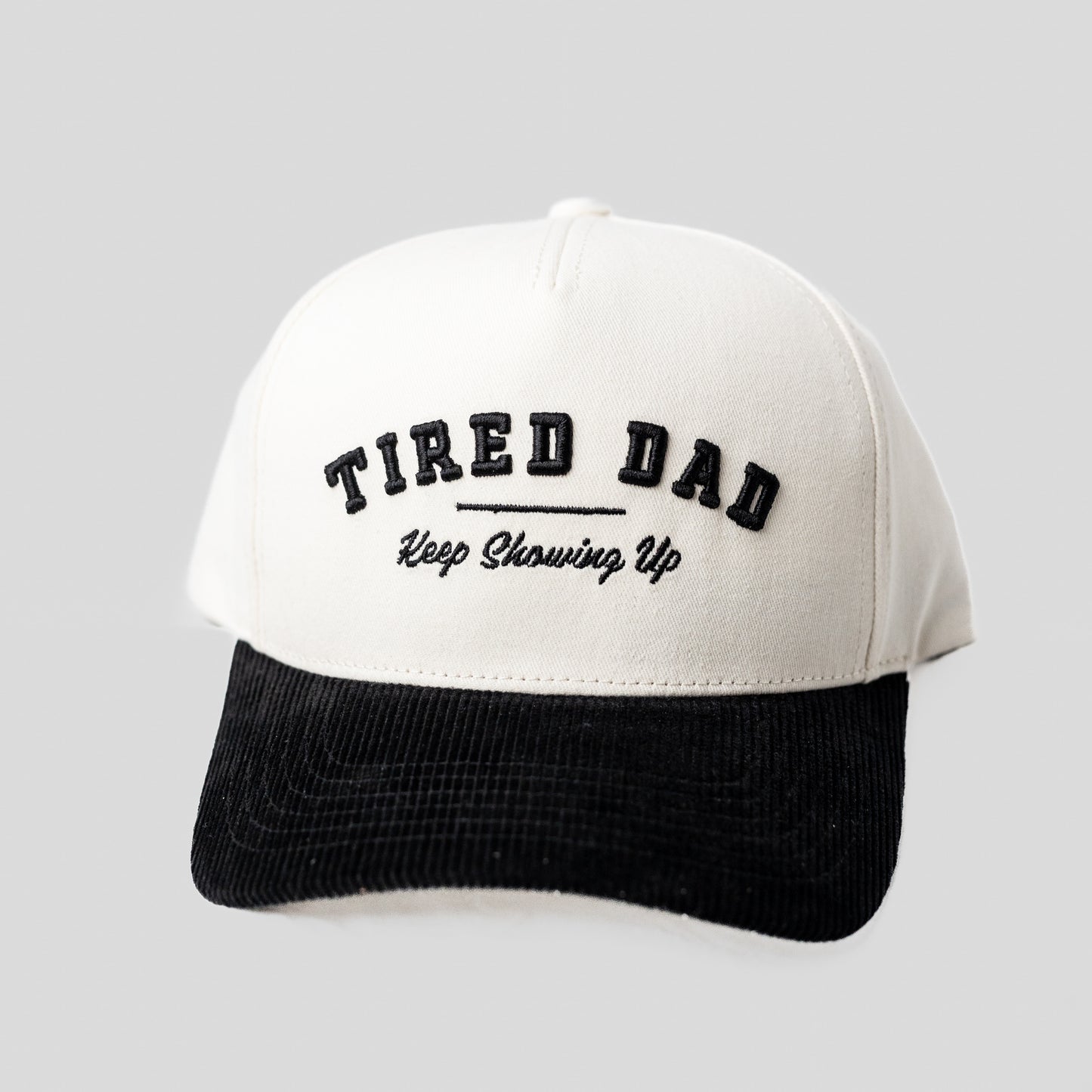 Tired Dad // Keep Showing Up // White & Black Snapback (Corduroy Visor)