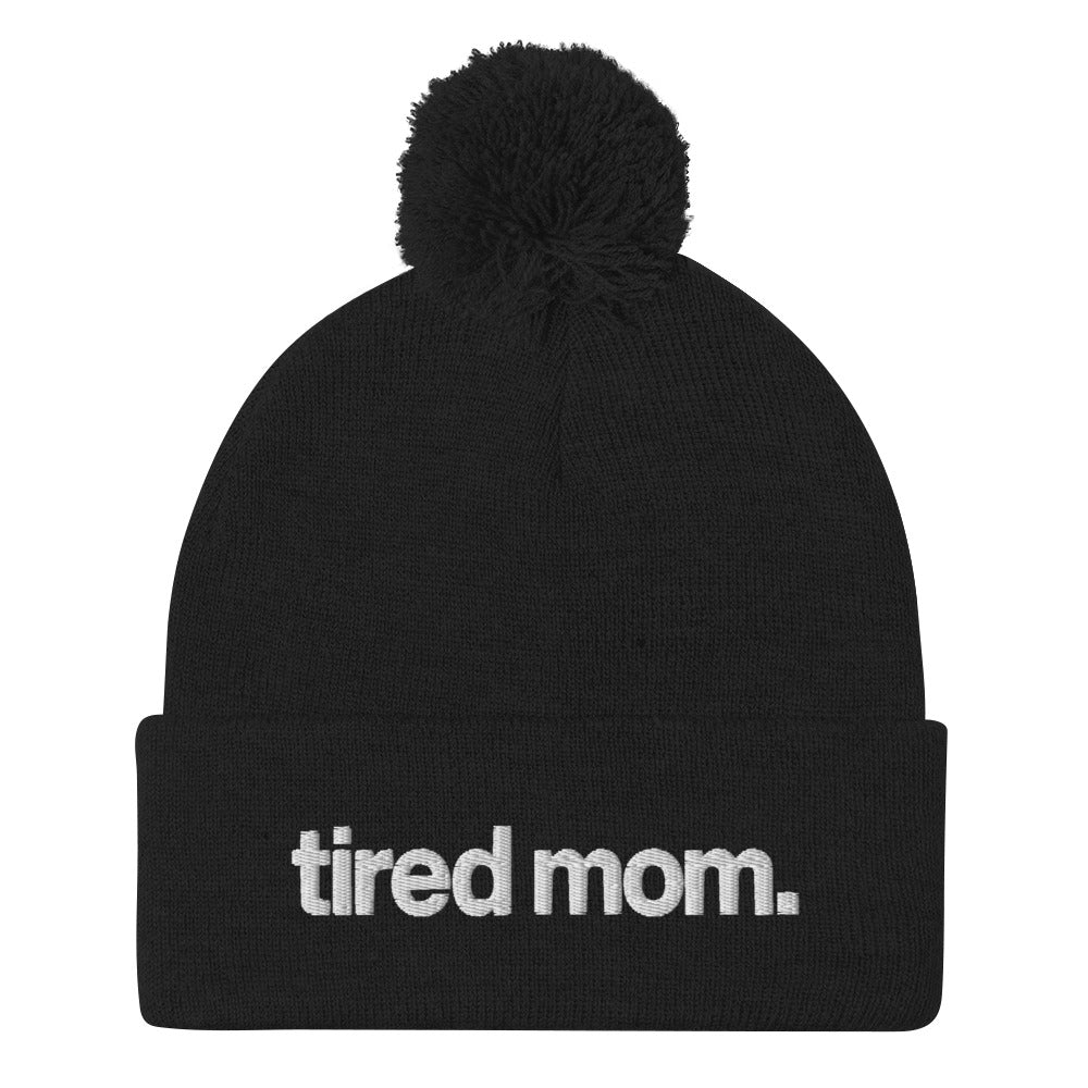 tired mom. pom-pom beanie