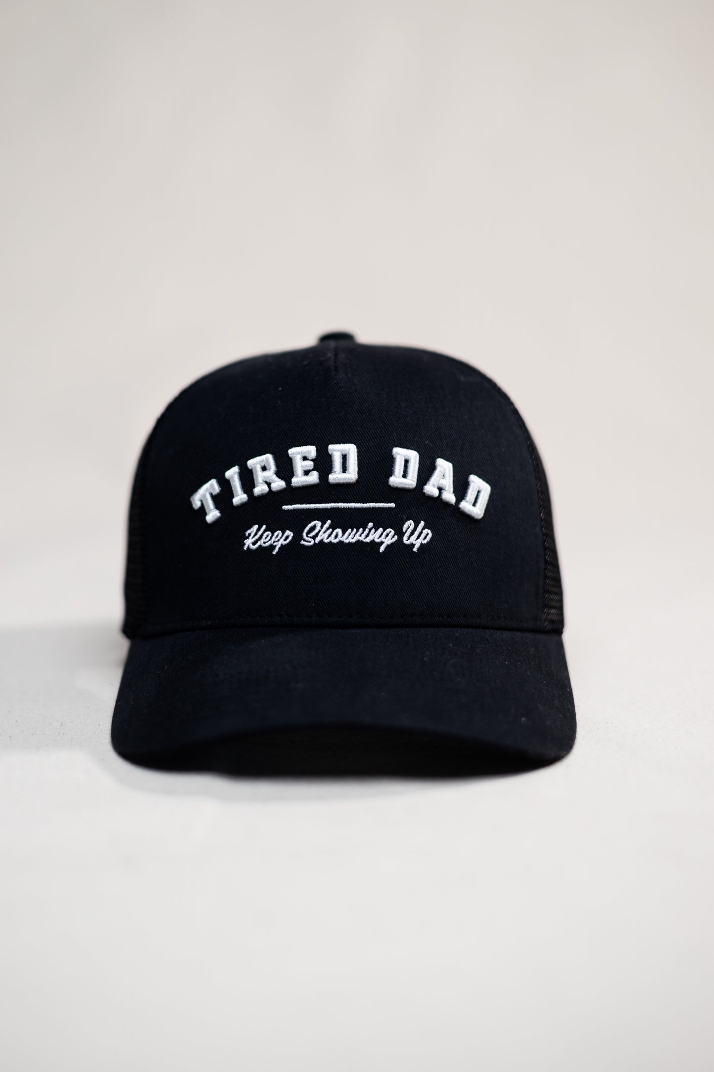 Tired Dad // Keep Showing Up // All Black Trucker